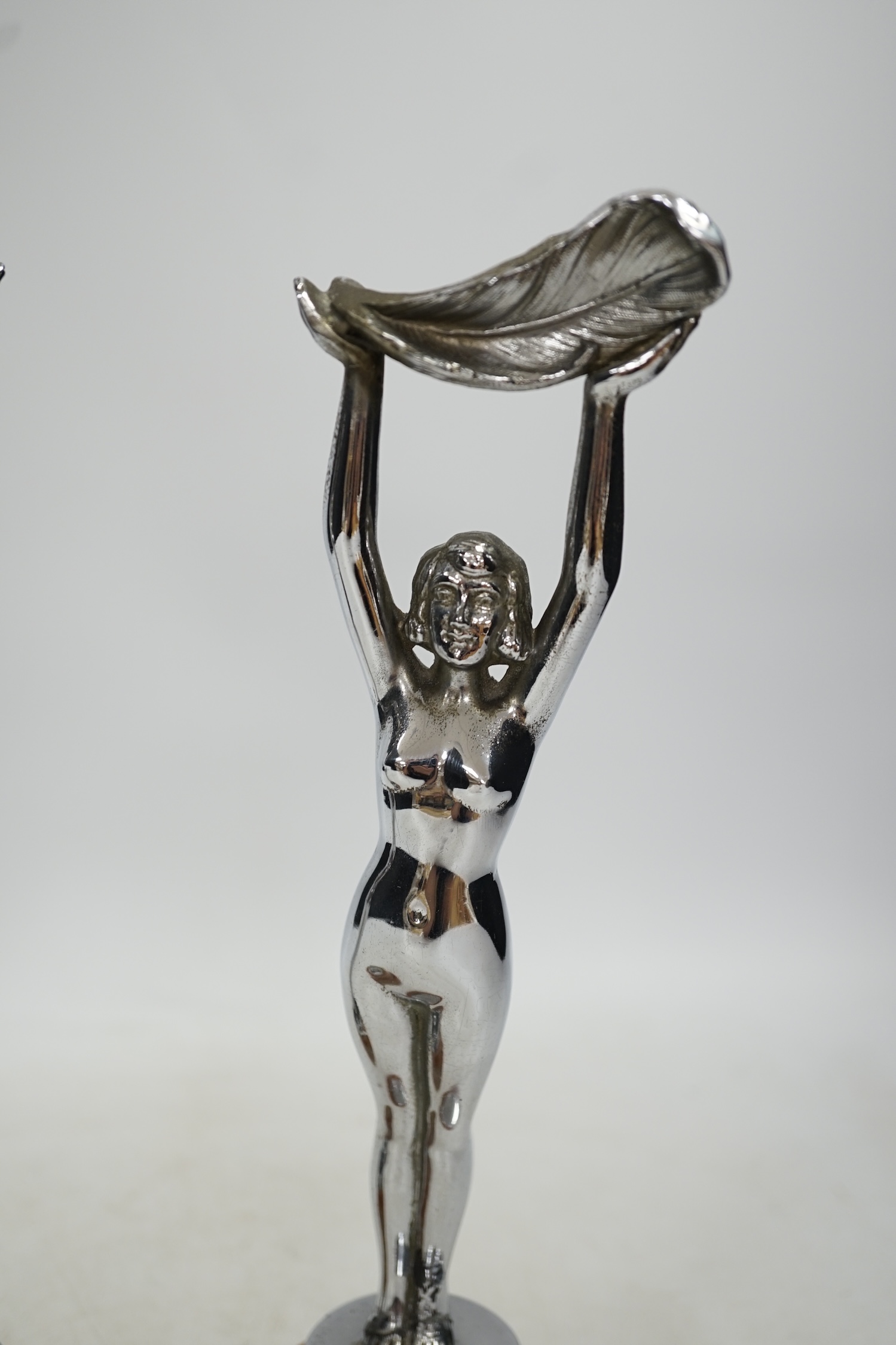 A pair of Art Deco chrome plated figures on onyx bases, 30cm. Condition - poor